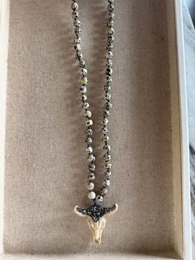 Cow skull beaded necklace.